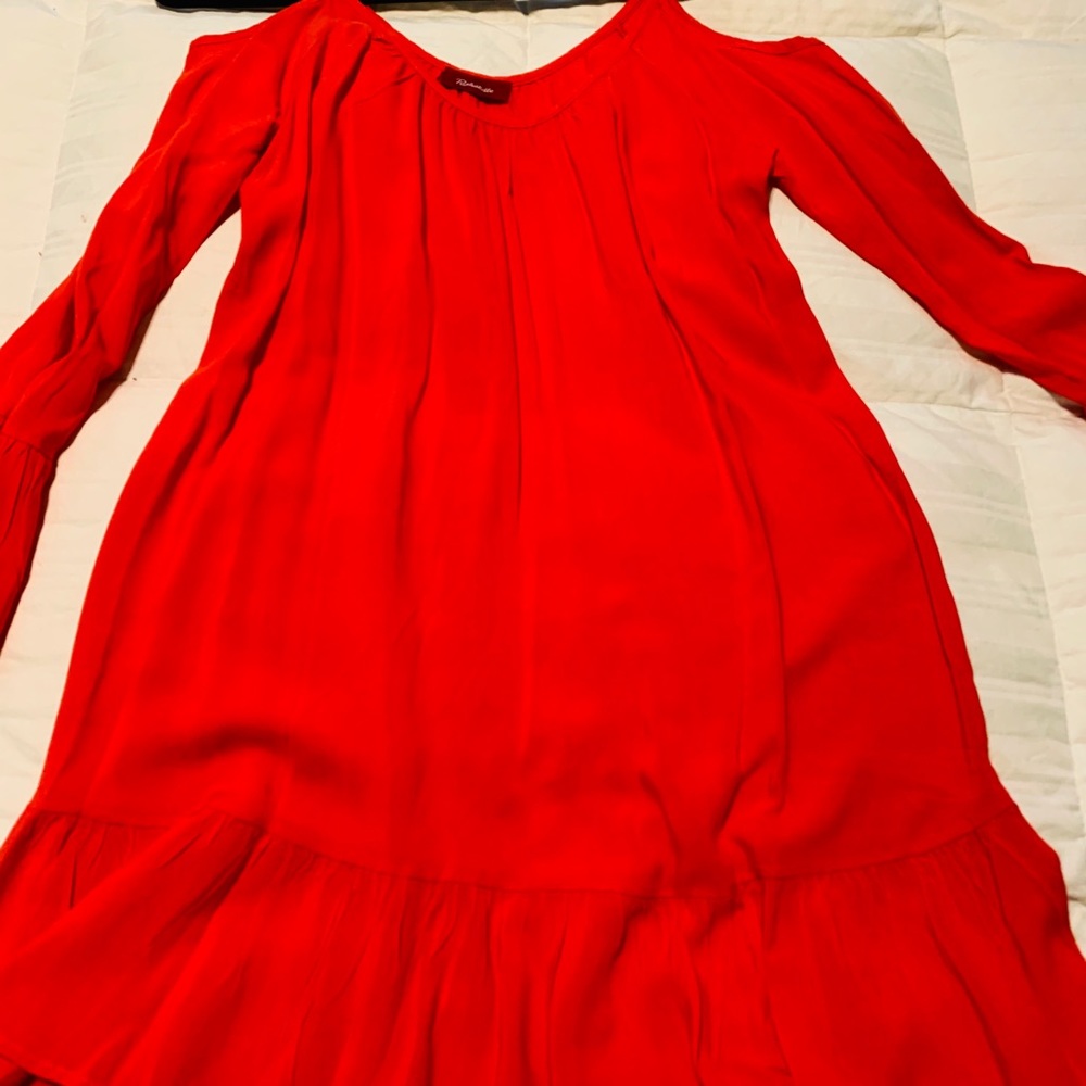 Orange ruffled sleeve